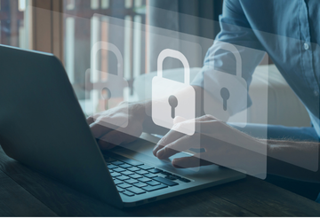Image of a padlock on top of a laptop